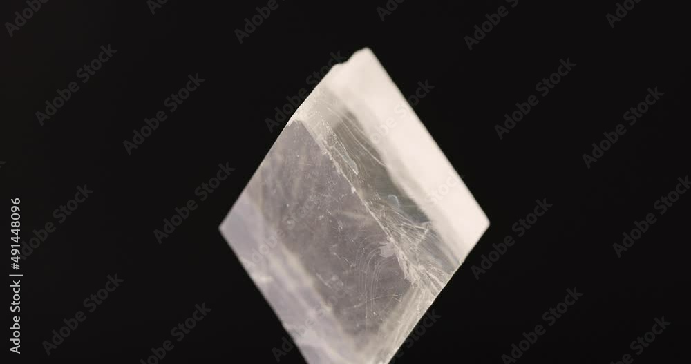 rotation of single Calcite mineral crystal on black background rotation of single Calcite mineral crystal on black background
