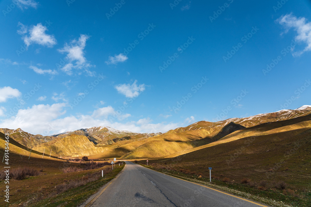 Winding asphalt road in a mountainous area