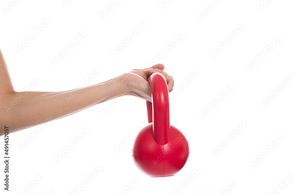 woman hand holding red kettlebell on white background, sport concept woman hand holding red kettlebell on white background, sport concept