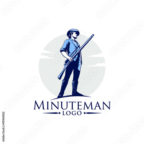 Minuteman soldier standing while holding a old riffle 