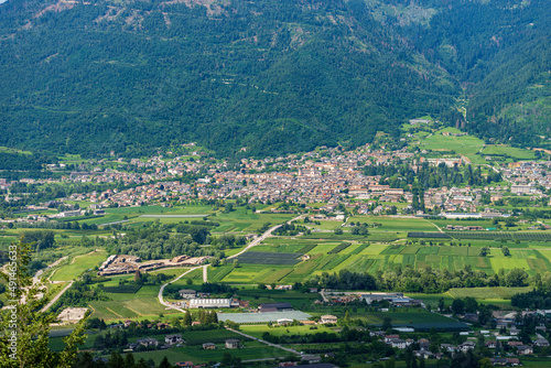 Aerial view of the small town of Levico Terme, tourist resort on the coast of Levico Lake, Valsugana (Sugana Valley), Trento province, Trentino Alto Adige, Italy, Europe. © Alberto Masnovo