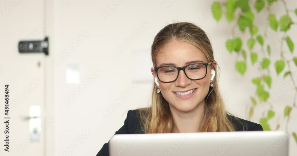Young woman working at home with laptop from her apartment. Home office concept. Gray notebook for working. High quality video Young woman working at home with laptop from her apartment. Home office concept. Gray notebook for working. High quality video