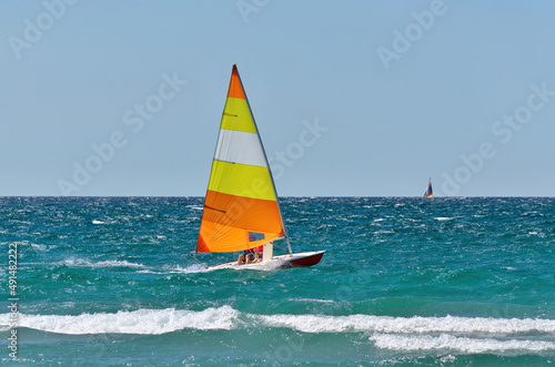 Colorful Sailboat Sailing on a Windy Sunny Summer Day on Georgian Bay 