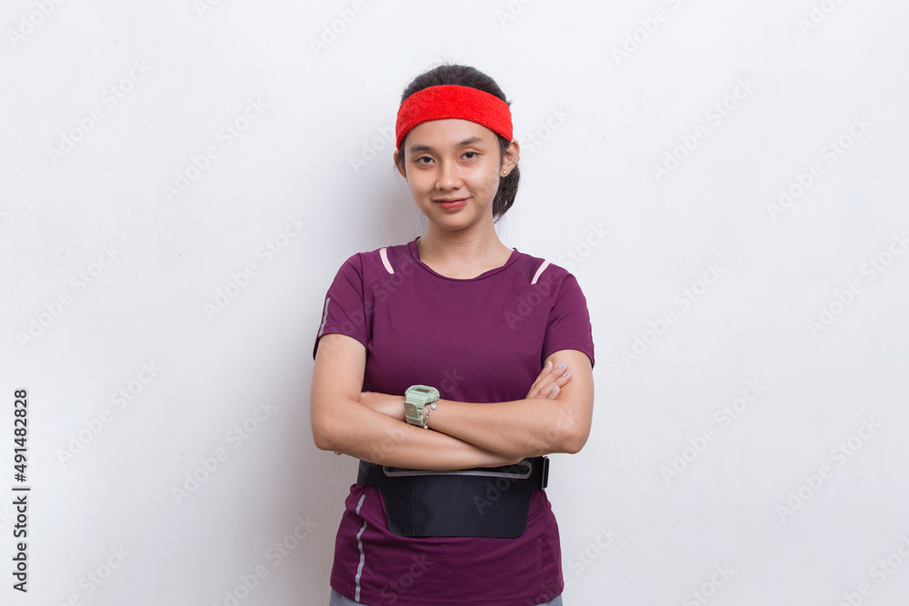 portrait of young beautiful asian sport woman on white background
portrait of young beautiful asian sport woman on white background