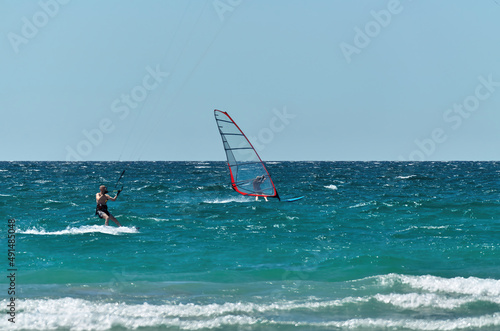 Kiteboard and Windsurf Action on a Windy Summer Day on Georgian Bay in Tiny Township