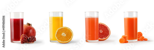 фотографія Four Freshly squeezed juices in glass on white isolated