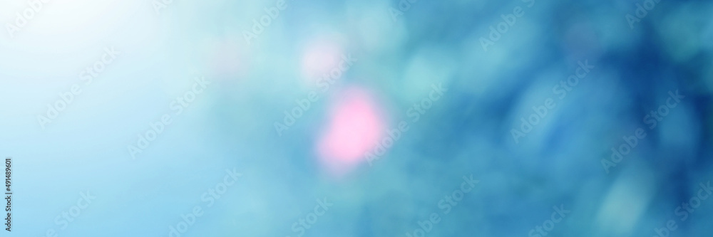 Light blue Leaf background. Blurred leaves and circular bokeh. Abstract for design and wallpaper. Light blue Leaf background. Blurred leaves and circular bokeh. Abstract for design and wallpaper.