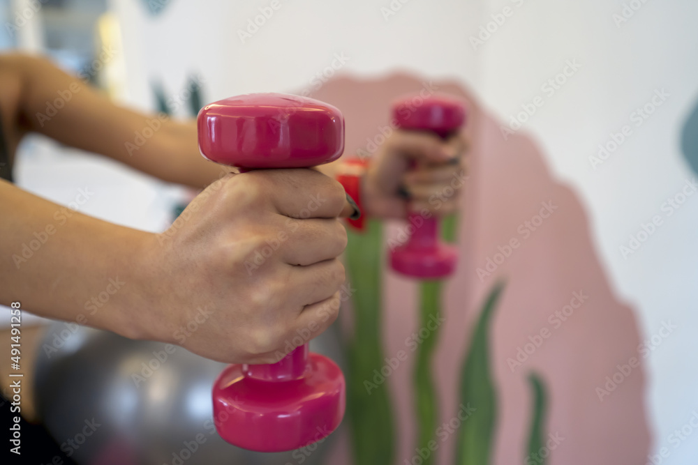 woman lifting weights woman lifting weights