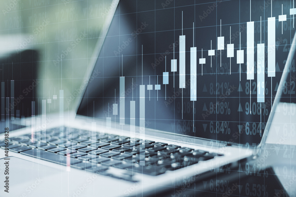 Double exposure of abstract creative financial diagram on modern laptop background, banking and accounting concept Double exposure of abstract creative financial diagram on modern laptop background, banking and accounting concept