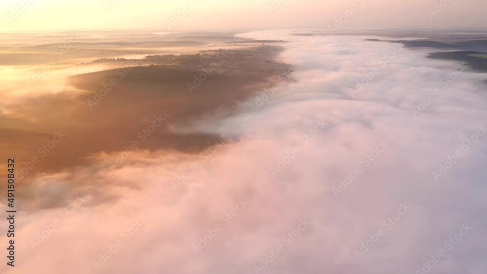 Fascinating panoramic view of the misty canyon of the Dniester River from a bird's eye view. Filmed in UHD 4k video. Fascinating panoramic view of the misty canyon of the Dniester River from a bird's eye view. Filmed in UHD 4k video.
