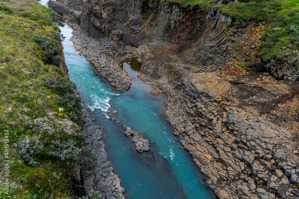 Beautiful aerial view of the studlagil canyon, and the largest number of basalt rock columns in Iceland