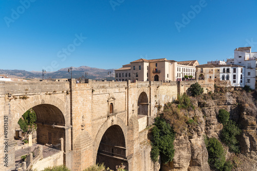 Puente Nuevo (New bridge) crossing El Tajo gorge in the famous white village of Ronda at daylight, Malaga province, Andalusia, Spain