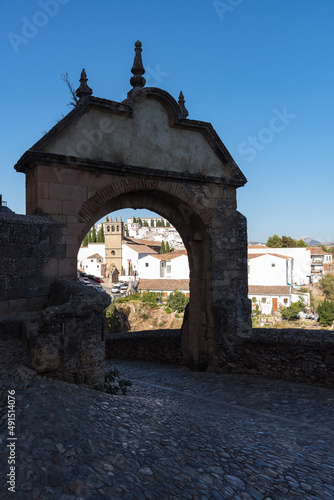 Puente Viejo  Old bridge  in the famous white village of Ronda at daylight  Malaga province  Andalusia  Spain