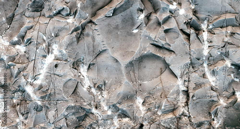 Silver Wall. Rock background. Rock texture. Dark marble. Stone background. Rock pile. Paint spots. Rock surface with cracks. Grunge Rough structure. Abstract texture. Silver Wall. Rock background. Rock texture. Dark marble. Stone background. Rock pile. Paint spots. Rock surface with cracks. Grunge Rough structure. Abstract texture.