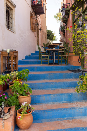 Small narrow street with blue stairs in Old Town of Rethymnon, Crete island, Greece © wjarek