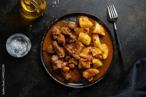 Meat and potato stew on plate