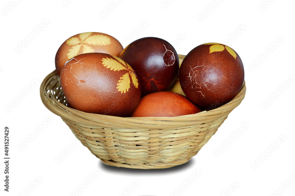 Easter basket full of cracked Easter eggs isolated on white background Easter basket full of cracked Easter eggs isolated on white background