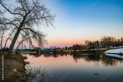 sunset over the lake in village 