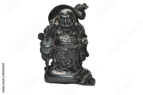 Laughing buddha statue isolated on black
