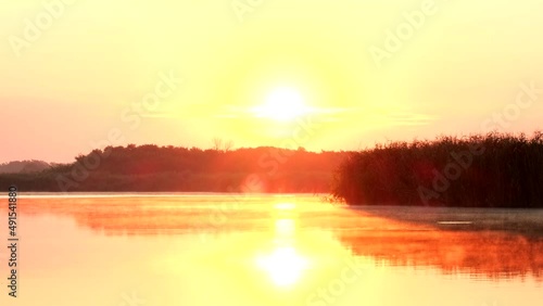 Wallpaper Mural Sunrise. Nature background. Beautiful morning landscape. Foggy calm river with fog in golden sunlight on water surface in early morning. Concept of travel nature meditation relaxation lifestyle Torontodigital.ca