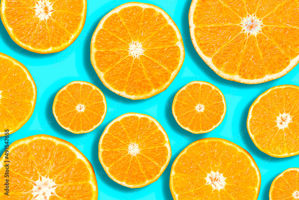 orange slice, isolated on blue background full depth of field. orange slice, isolated on blue background full depth of field.