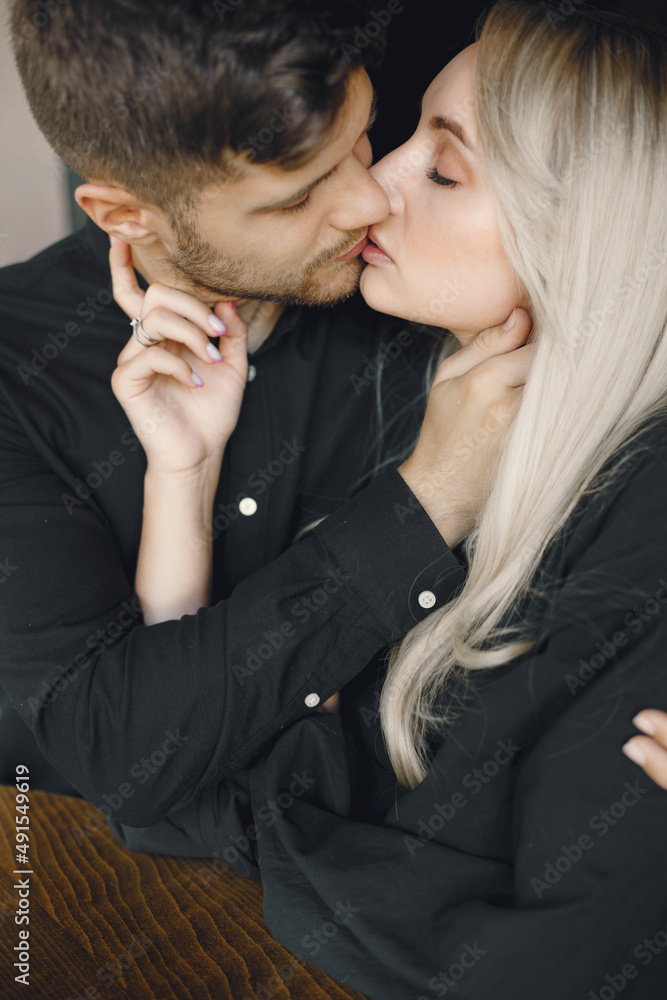 Fototapeta premium Close-up portrait of young couple in love embracing