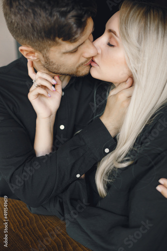 Close-up portrait of young couple in love embracing