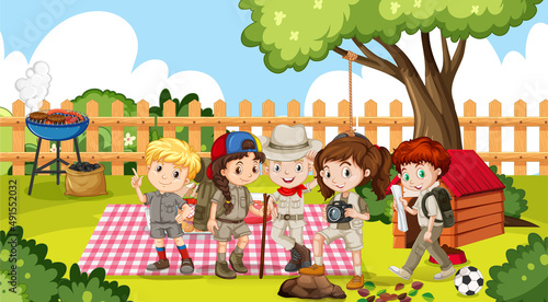 Boys and girls picnic in garden
