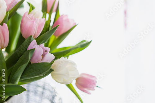 Fototapeta Naklejka Na Ścianę i Meble -  Fresh tulip flower bouquet over blurred background, nature background, wedding day decoration, srping season