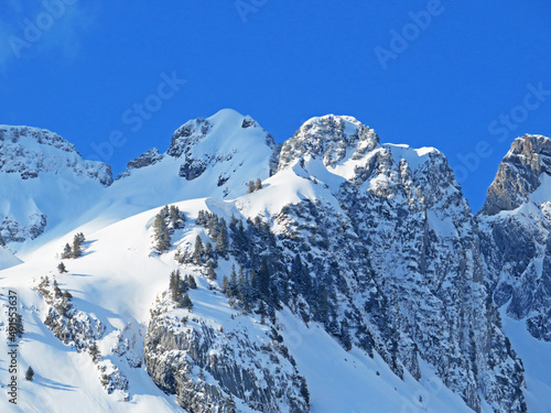 Snow-capped alpine peak Schwarzchopf (1949 m) in Alpstein mountain range and in Appenzell Alps massif, Unterwasser - Canton of St. Gallen, Switzerland (Schweiz) photo