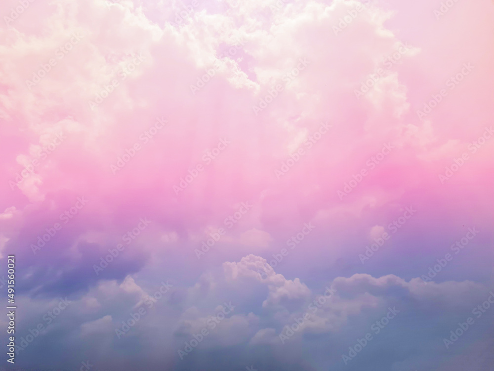 Pink and blue sky with dense clouds. Use for bright sweet sky backgrounds.