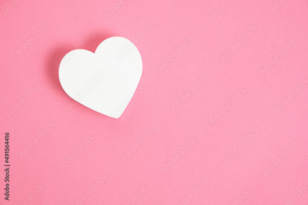 White heart pink background.Festive background for Valentines Day.