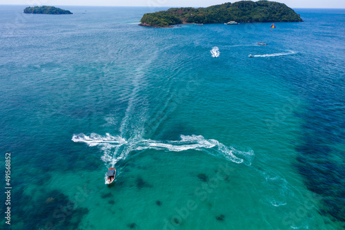 Tourists are playing parasailing game on Phu Quoc island, Vietnam