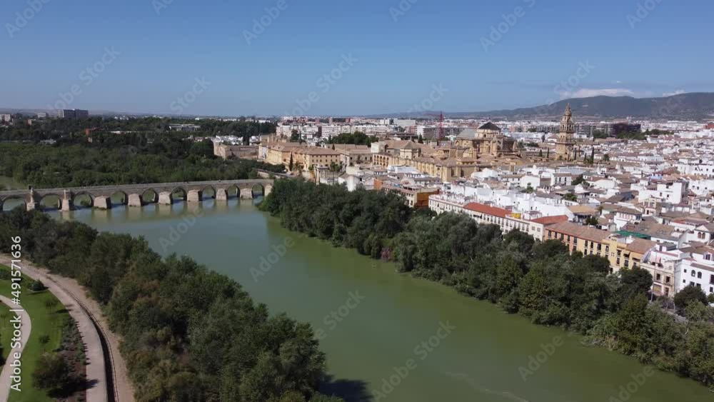 Aerial view of the old medieval city of Cordoba in Andalusia, Spain during a sunny day. Medieval mosque cathedral and Roman bridge over Guadalquivir river, UNESCO World Heritage site. Tourism.
Aerial view of the old medieval city of Cordoba in Andalusia, Spain during a sunny day. Medieval mosque cathedral and Roman bridge over Guadalquivir river, UNESCO World Heritage site. Tourism.
