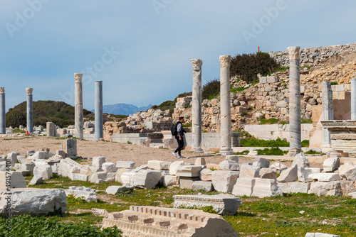 Knidos was a Greek city in ancient Caria, located by sea in Datca, Mugla, Turkey.  A tourist, traveler boy discovering places.
