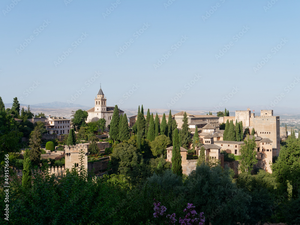 Amazing sunny View of the Alcazaba in Alhambra, Granada. Moorish Architecture. Unesco World Heritage Spain. Travel in time and discover history. Amazing destinations for holidays. 