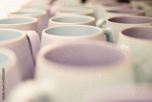 empty cups for coffee or tea close-up on a shelf in a supermarket.Background with cups