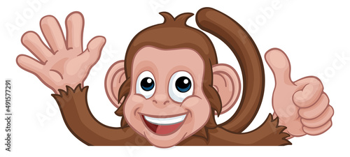 Monkey Cartoon Animal Behind Sign Thumbs Up Waving photo