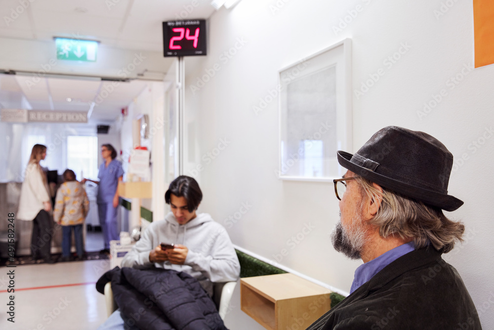Patients waiting in outpatient clinic Patients waiting in outpatient clinic