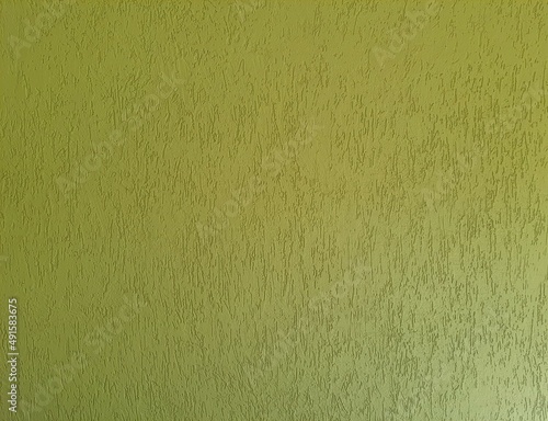 Surface of a textured wall in yellow color, front view, full screen.