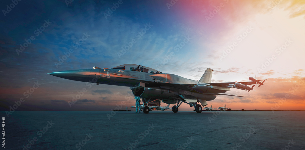 Naklejka military jet aircraft parked on runway in sunset.