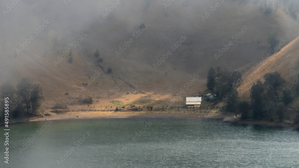 Foggy and misty background with blurry background of lake