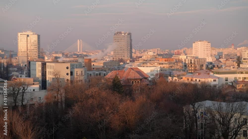 Bucharest from above during a winter sunrise. 4k video with the main landmarks from Calea Victoriei in Bucharest, Romania, filmed in the morning. Bucharest from above during a winter sunrise. 4k video with the main landmarks from Calea Victoriei in Bucharest, Romania, filmed in the morning.