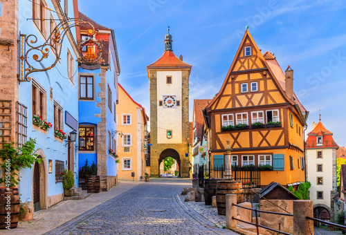 Rothenburg ob der Tauber  Bavaria  Germany. Medieval town of Rothenburg on a summer morning. Plonlein  Little Square  and the two towers of the old city wall.