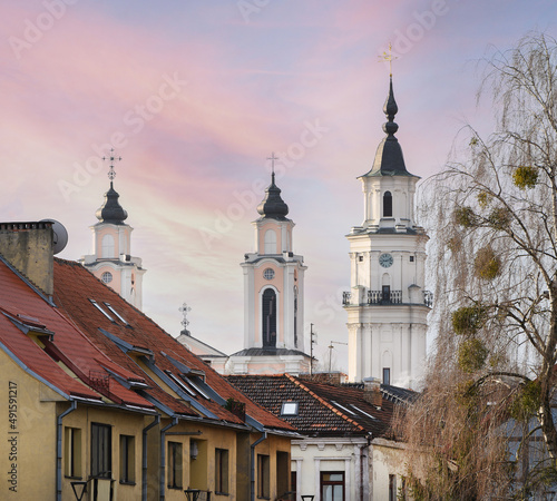 Amazing Kaunas city viewing perspective. Old town buildings, town hall towers. Kaunas European Capital of Culture 2022. Unique street, city life. photo