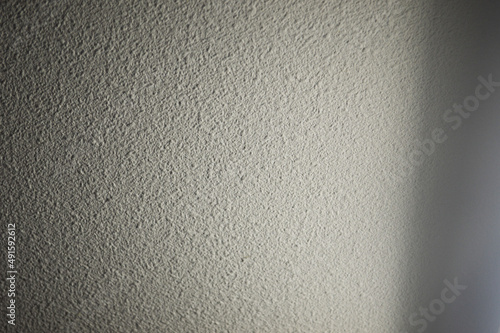 white wall light , surface textured , abstract
