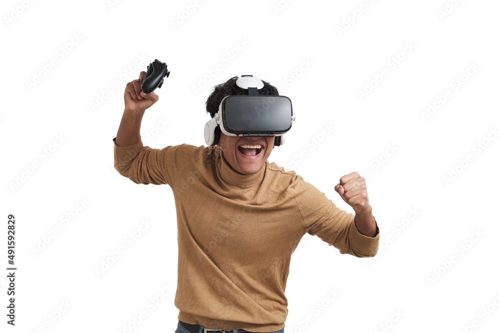 Young peruvian man playing video games with a joystick and vr headset. Isolated over white background. Young peruvian man playing video games with a joystick and vr headset. Isolated over white background.