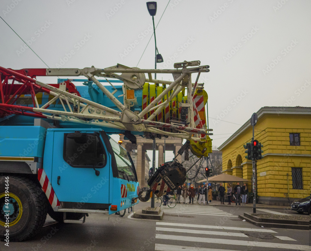 Closeup of large mobile crane on the road