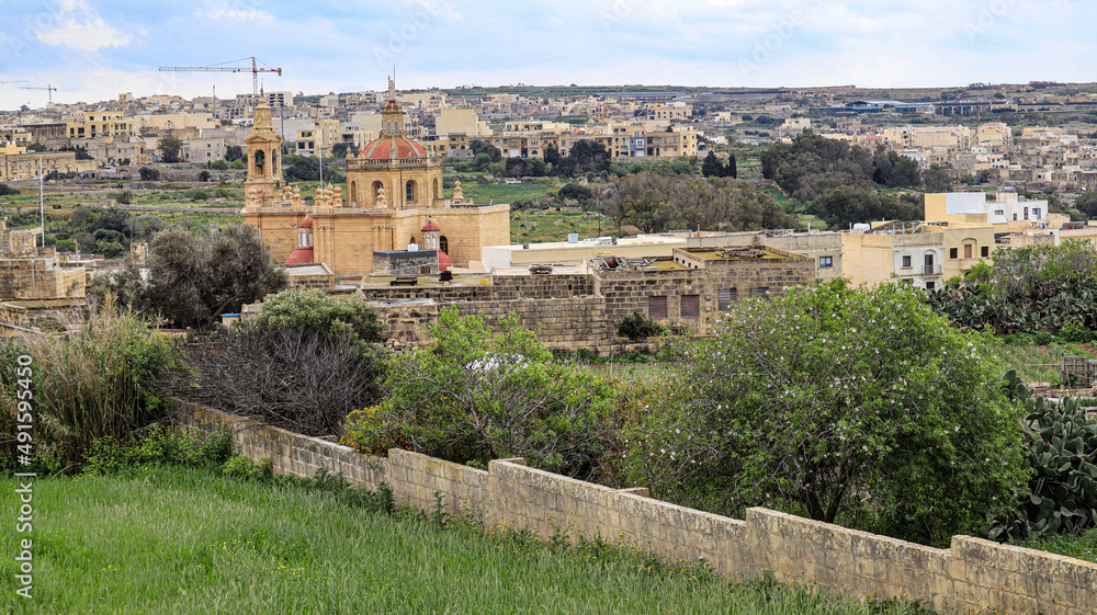 munxar church and village on the Mediterranean island
of Gozo in the Maltese archipelago.