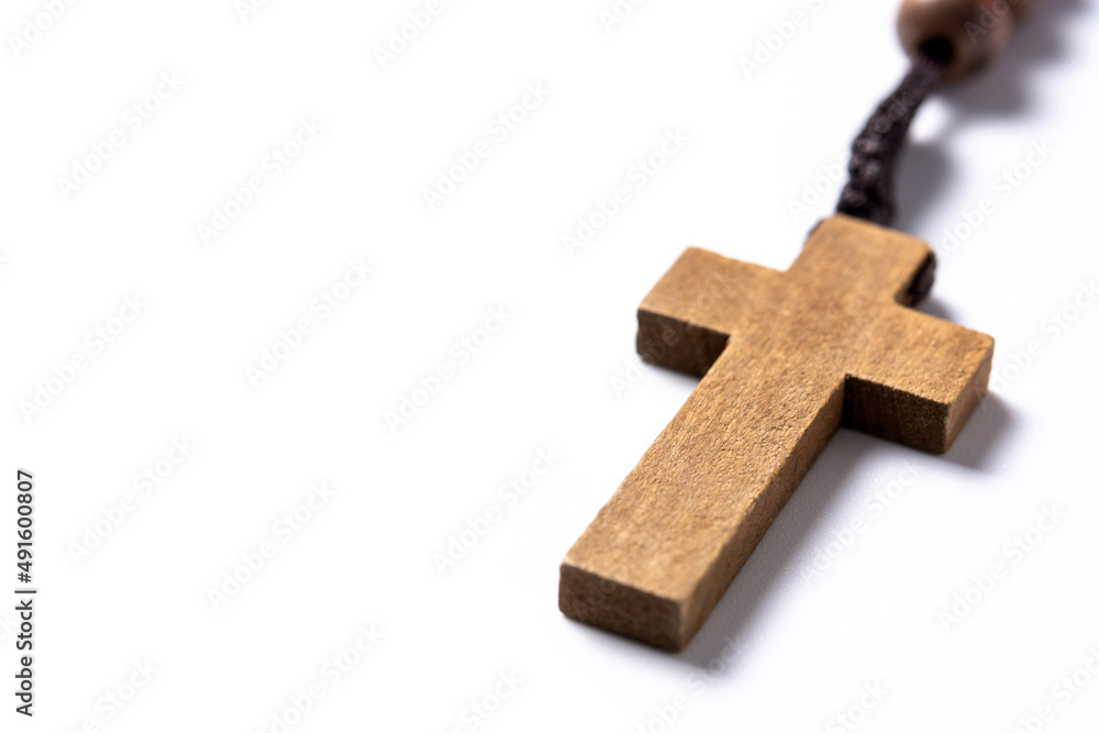 Rosary catholic cross isolated on white background. Copy space Rosary catholic cross isolated on white background. Copy space